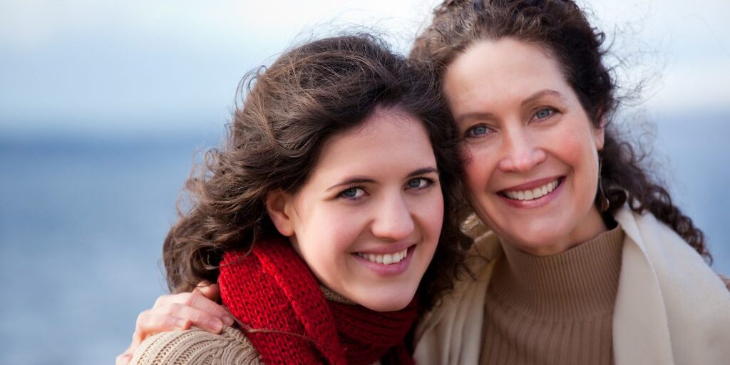 Photo of happy mother and daughter